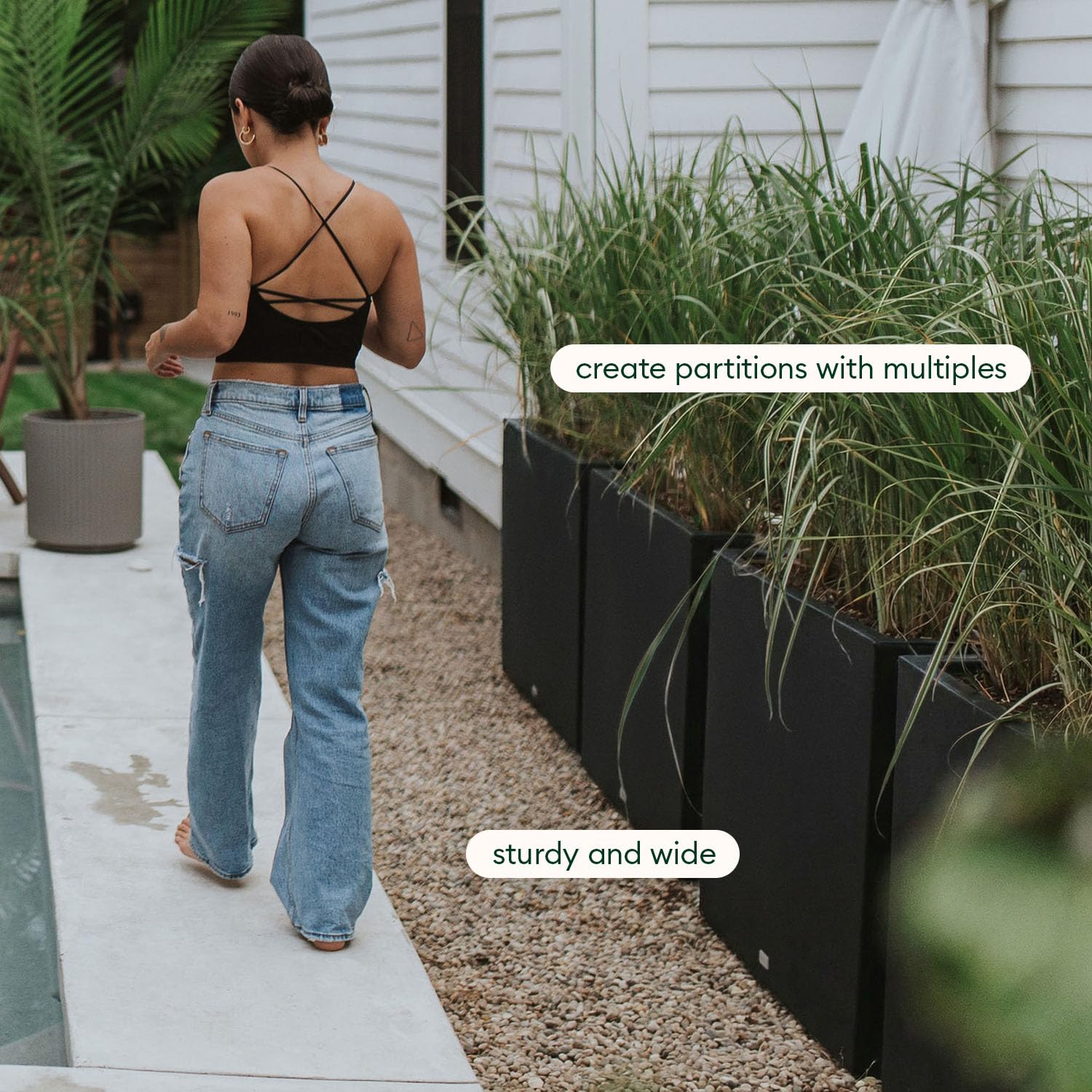 Veradek Span planted with ornamental grass illustrating vertical texture benefit