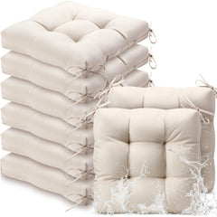 Vercraft front view of eight beige chair cushions showing coordinated set and style