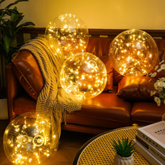 Vertintong front view of illuminated inflatable ball adding warm ambiance