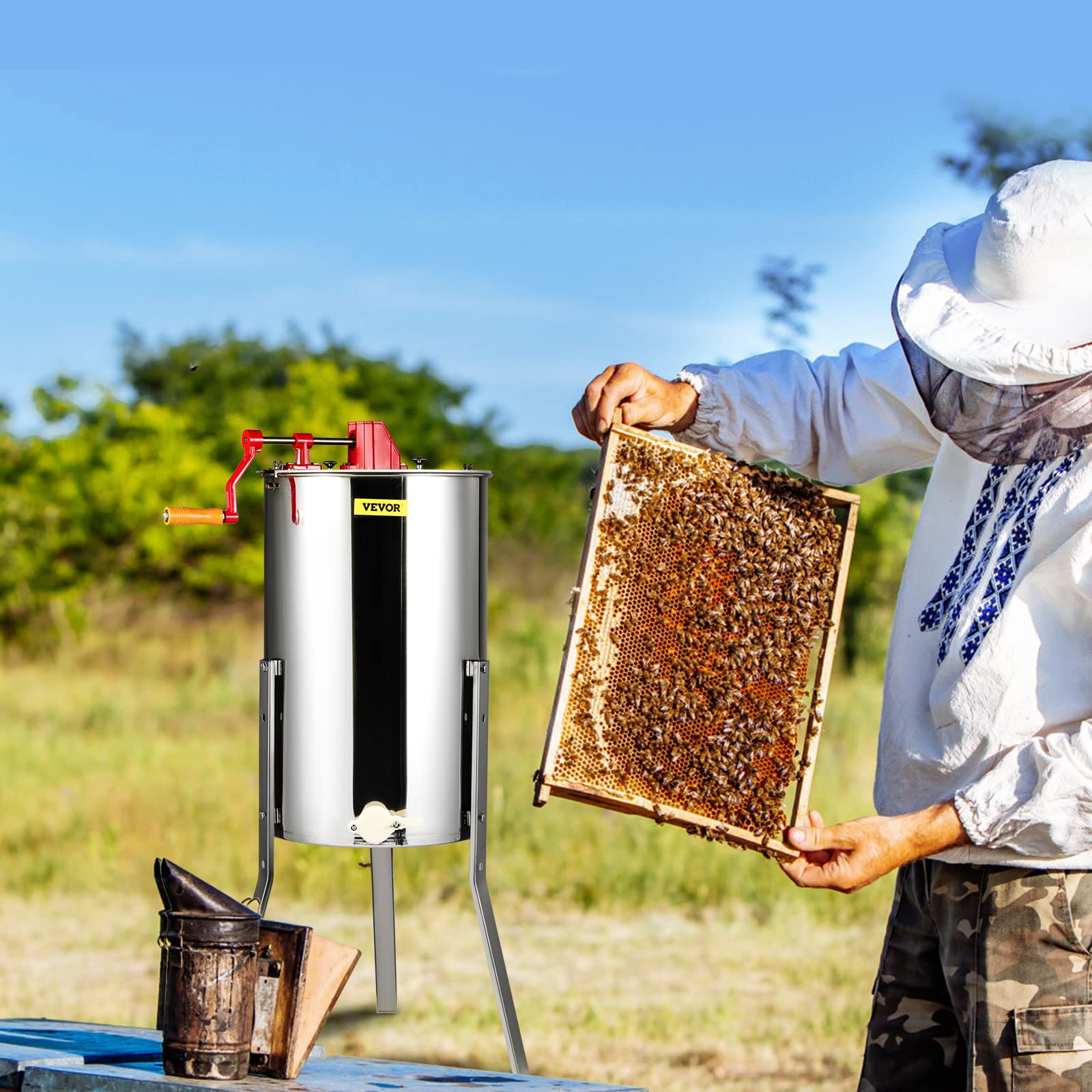 VEVOR extractor in use at a backyard apiary highlighting hands-on controlled extraction