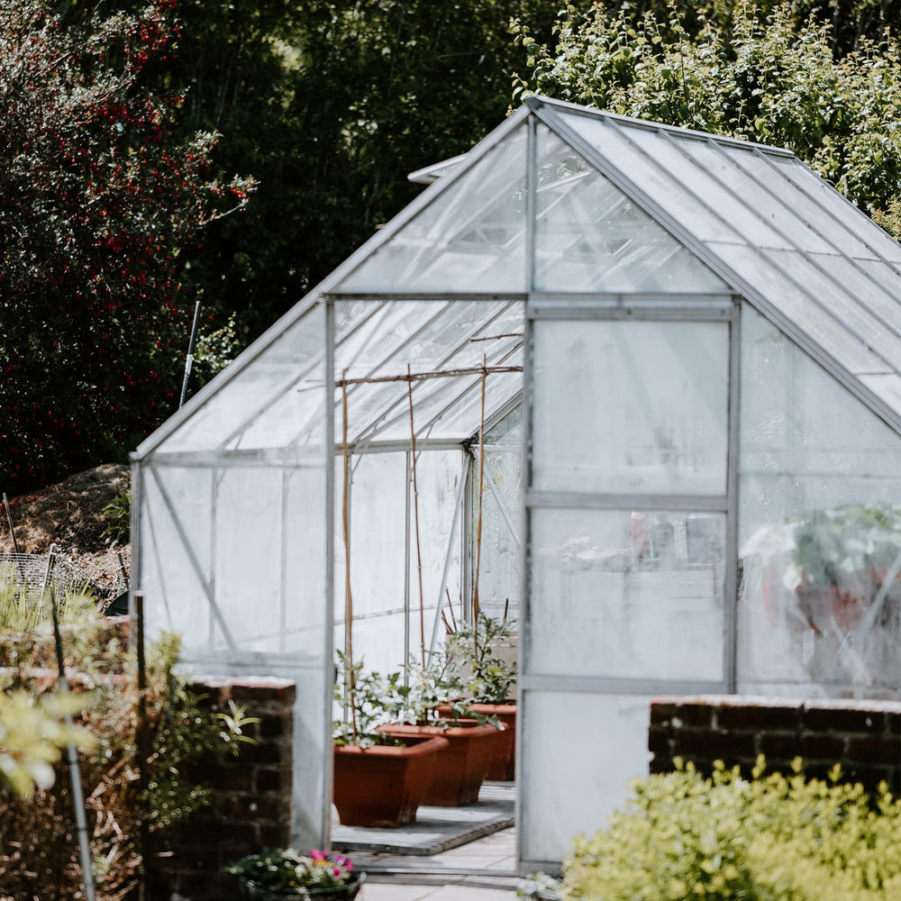 VEVOR film covering garden beds in lifestyle setting for seasonal use