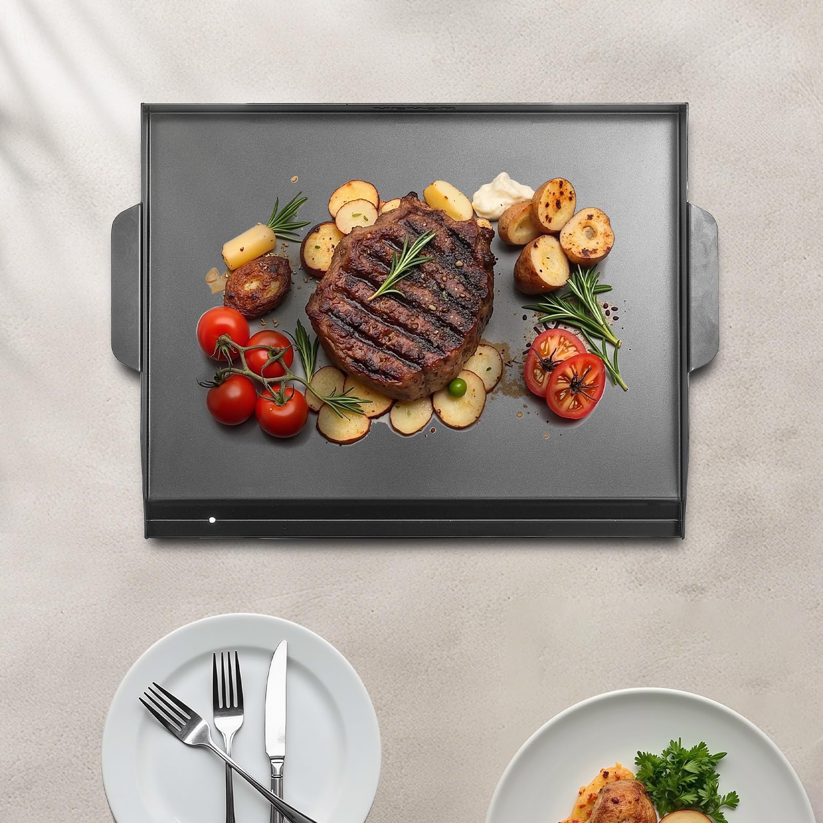 VEVOR griddle next to spatula and plate showing scale and family portion capability