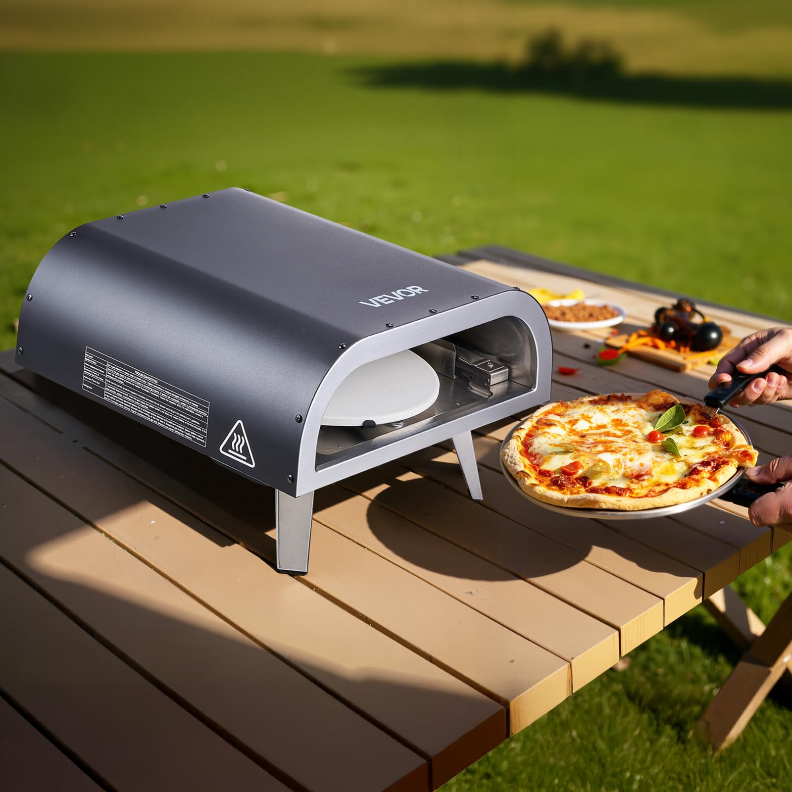 VEVOR oven in backyard setting showing social cooking and entertaining advantage