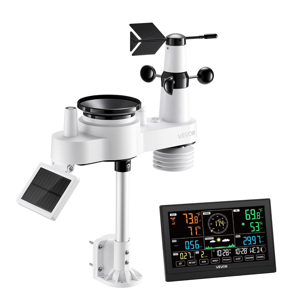 VEVOR weather station beside hand for scale showing compact size