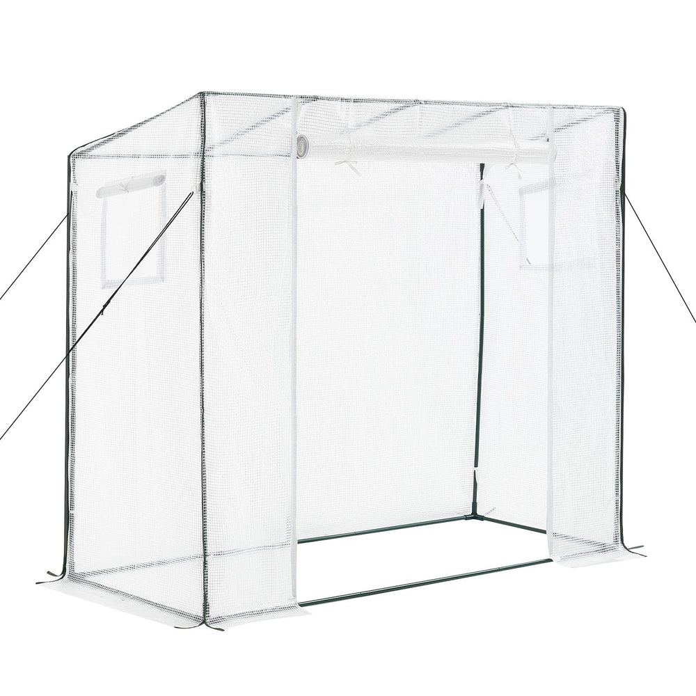 VEVOR greenhouse next to gardener showing size and ergonomic access