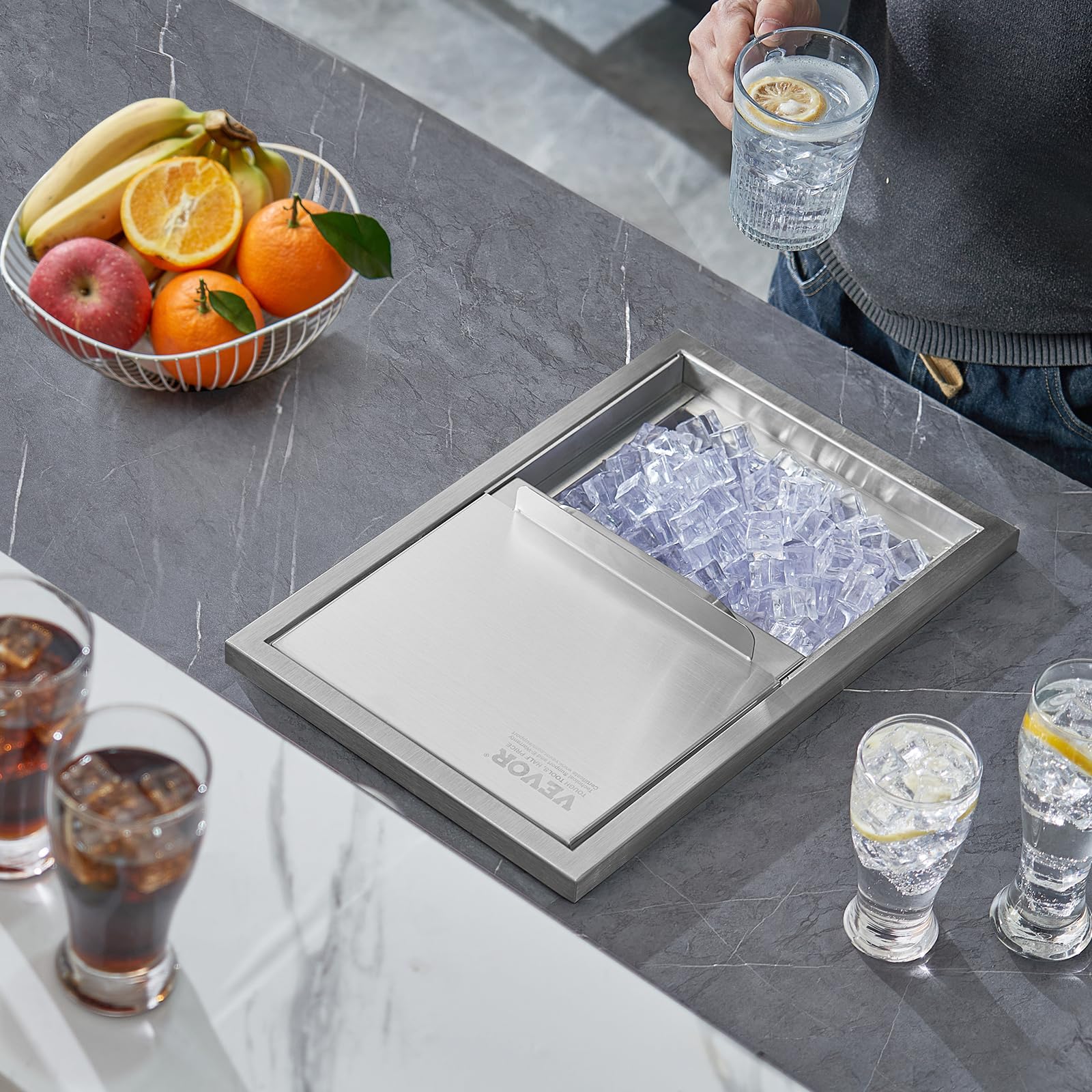 VEVOR beside a standard bottle for scale to show compact 18-inch footprint