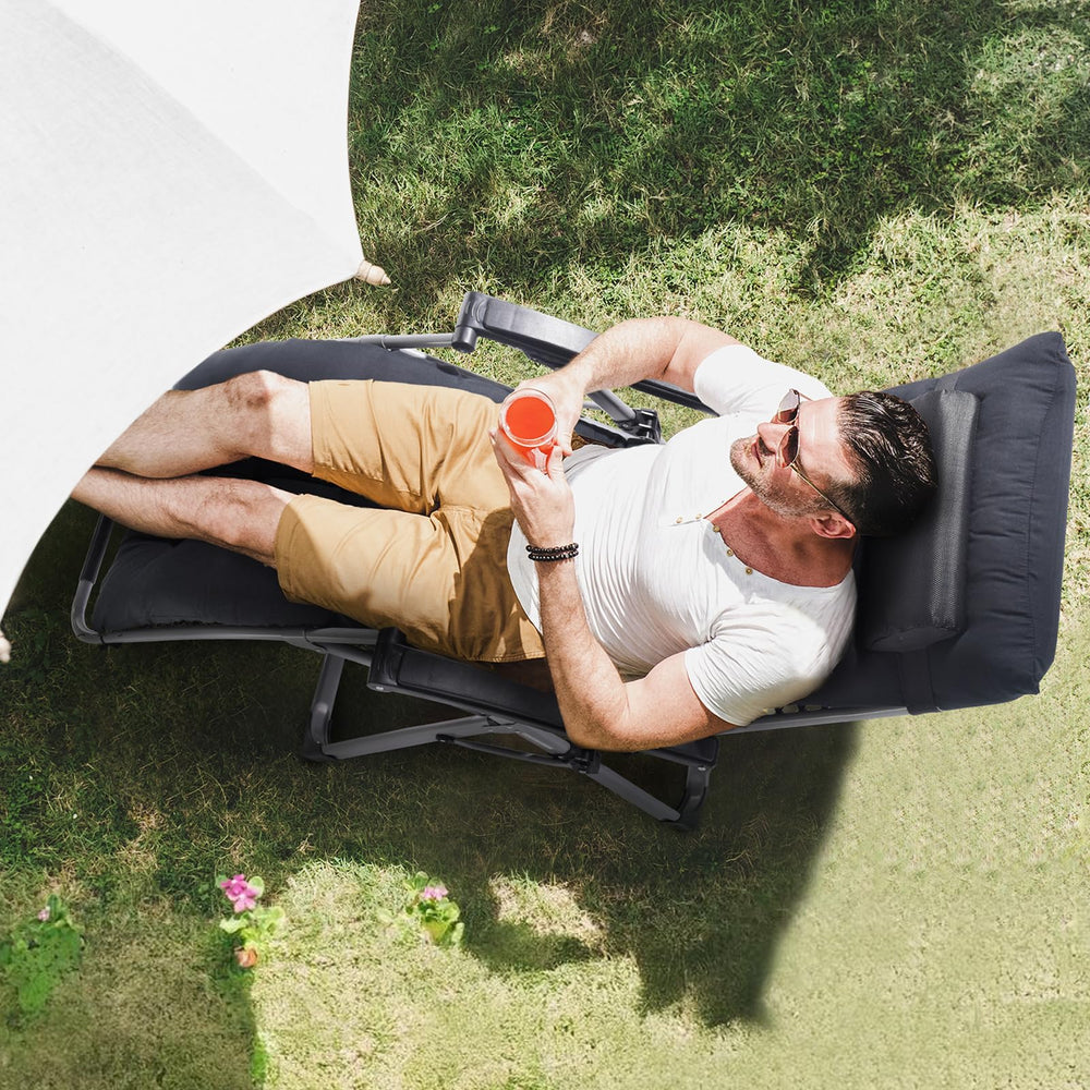 VEVOR chair with person demonstrating 500 lb capacity and scale