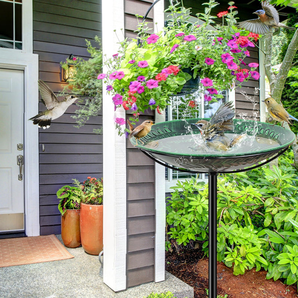 VeyFolzin.st bird bath in garden with songbirds attracted showcasing wildlife-friendly design