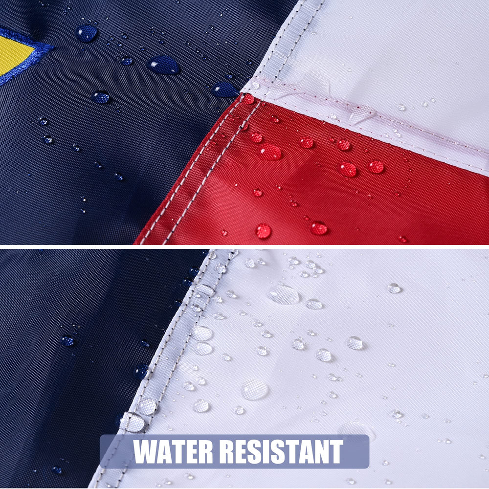 VICDRIA flag flying on a home pole demonstrating wind resistance and visibility
