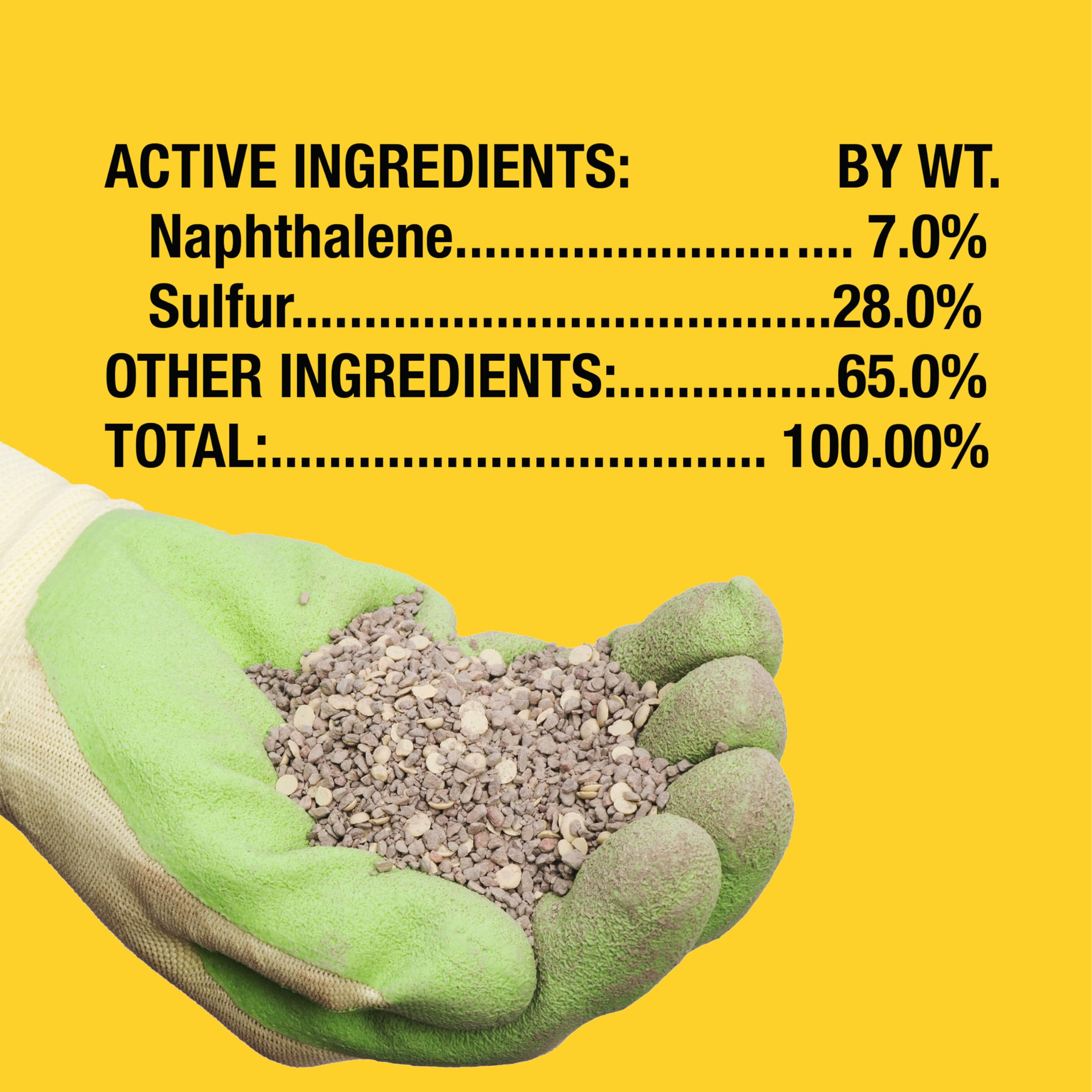 Victor granules being poured into spreader for even distribution and coverage