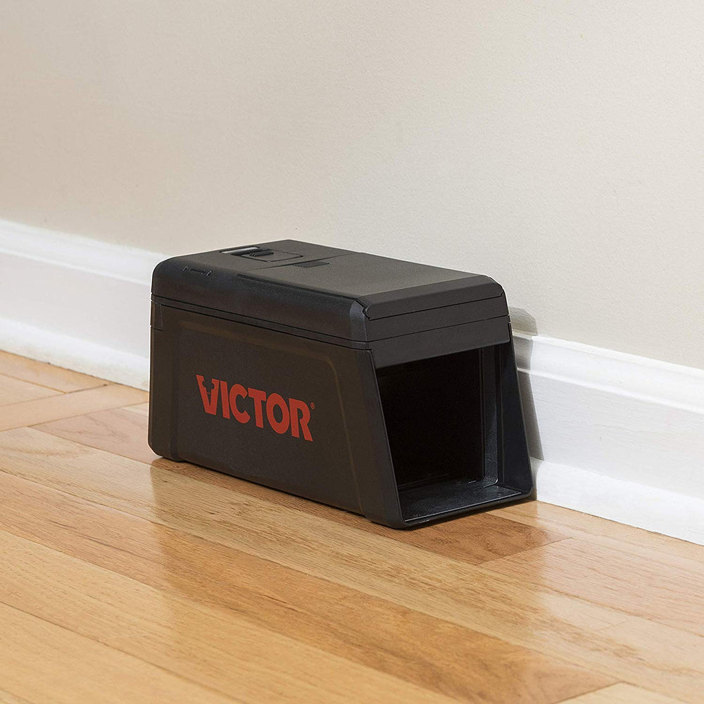 Victor held in hand to show scale and compact design for discreet placement benefit