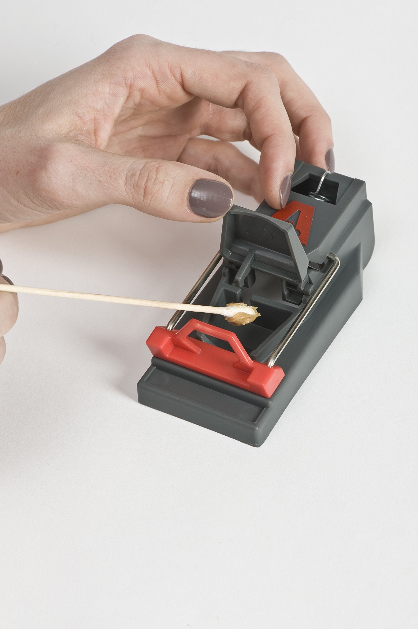Victor held in hand to show compact size and effortless placement