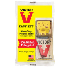 Victor trap set along kitchen baseboard for discreet, effective placement
