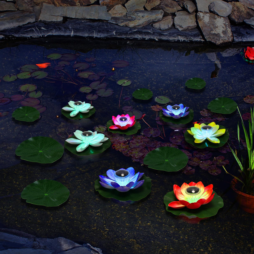 VIHOSE lotus lights floating in backyard pond adding ambient nighttime atmosphere