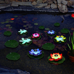 VIHOSE lotus lights floating in backyard pond adding ambient nighttime atmosphere