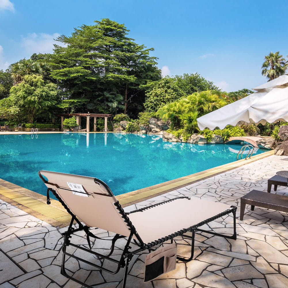 VILLEY chaise lounge in use poolside showing comfortable reclining outdoors