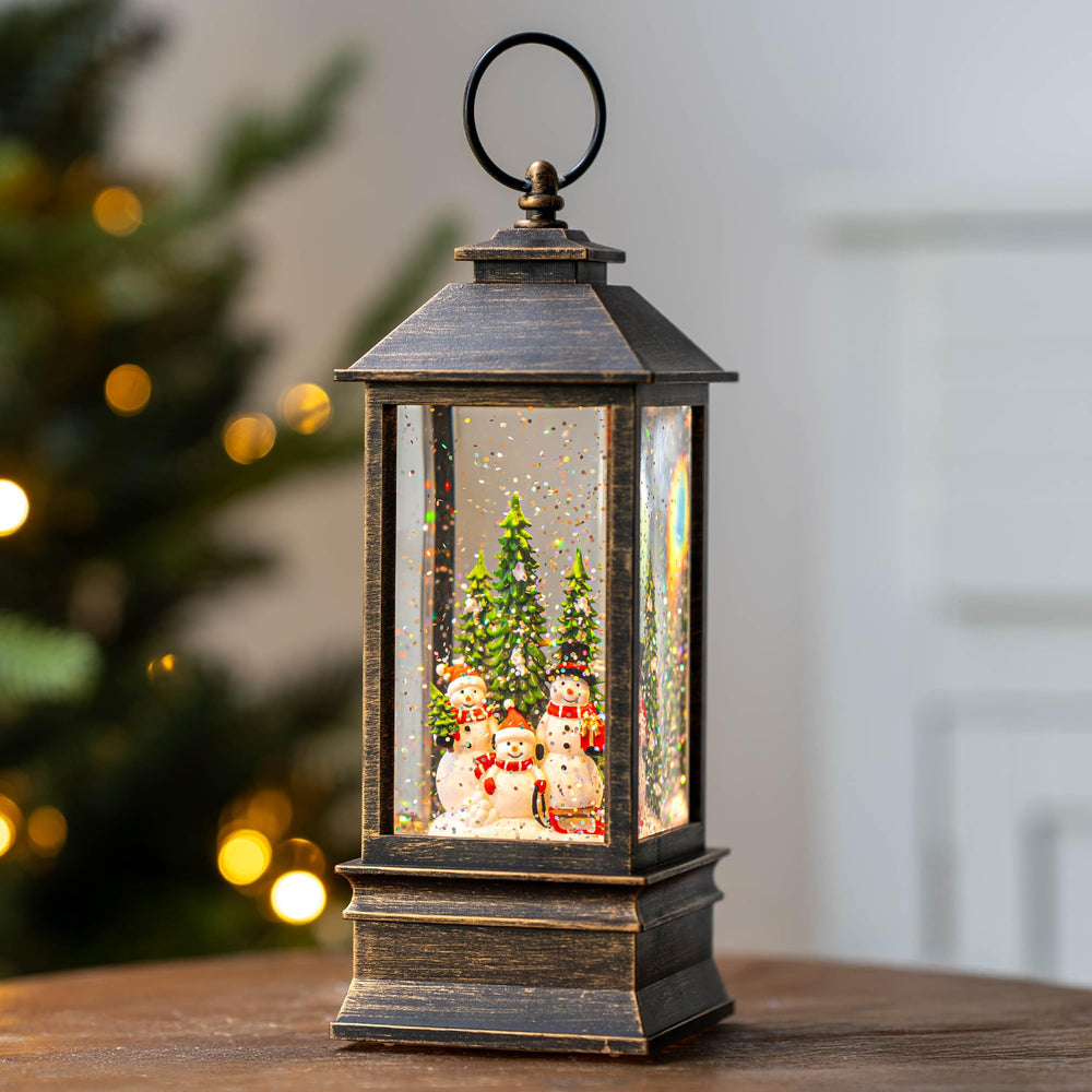 VISFLAIR globe on a mantel in a living room showing festive decorative impact