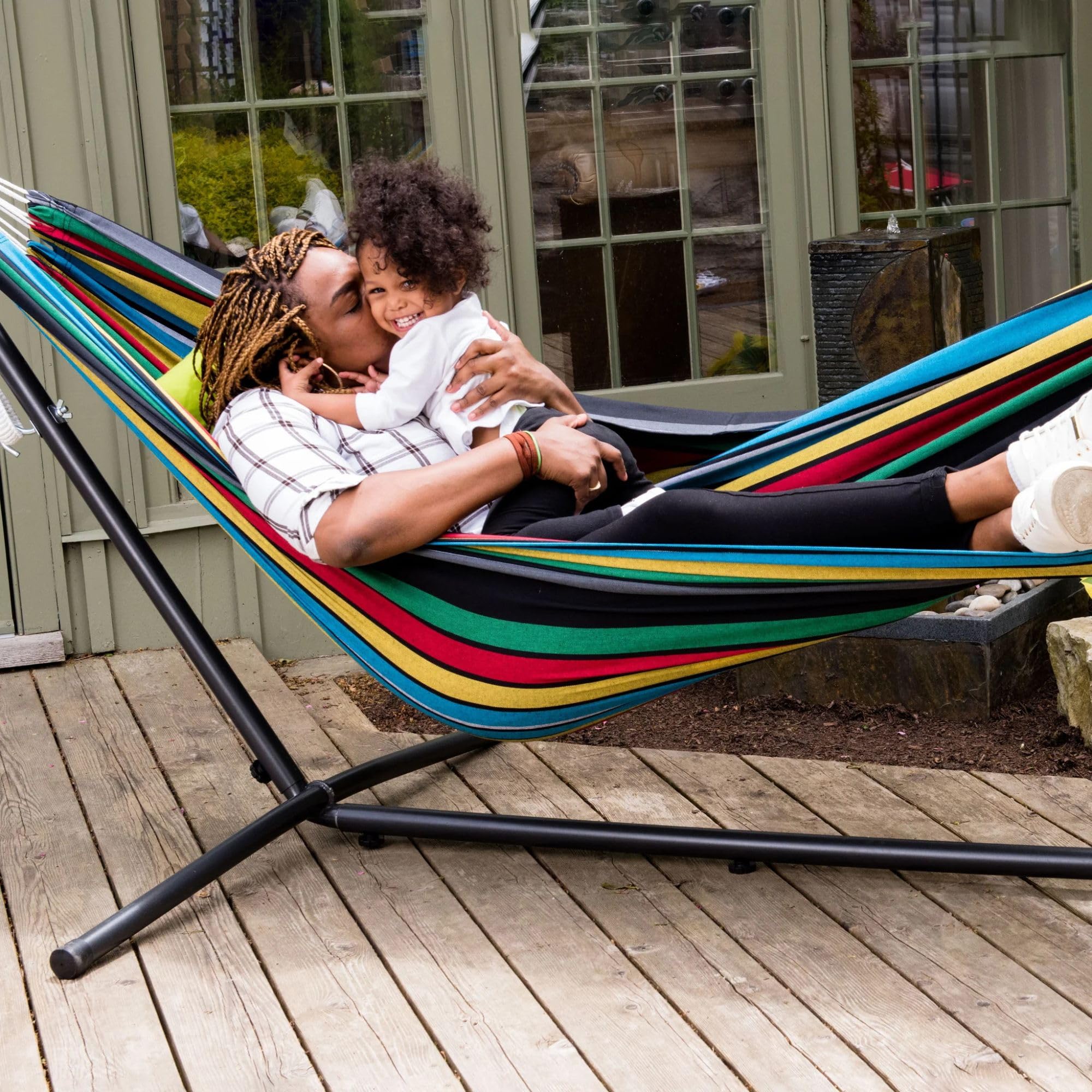 Vivere hammock beside chair showing scale and ample two-person space benefit