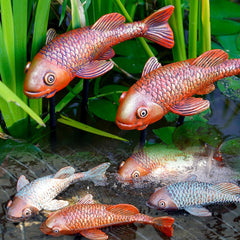 VKEVOC front view of two brassy koi statues, elegant garden focal point