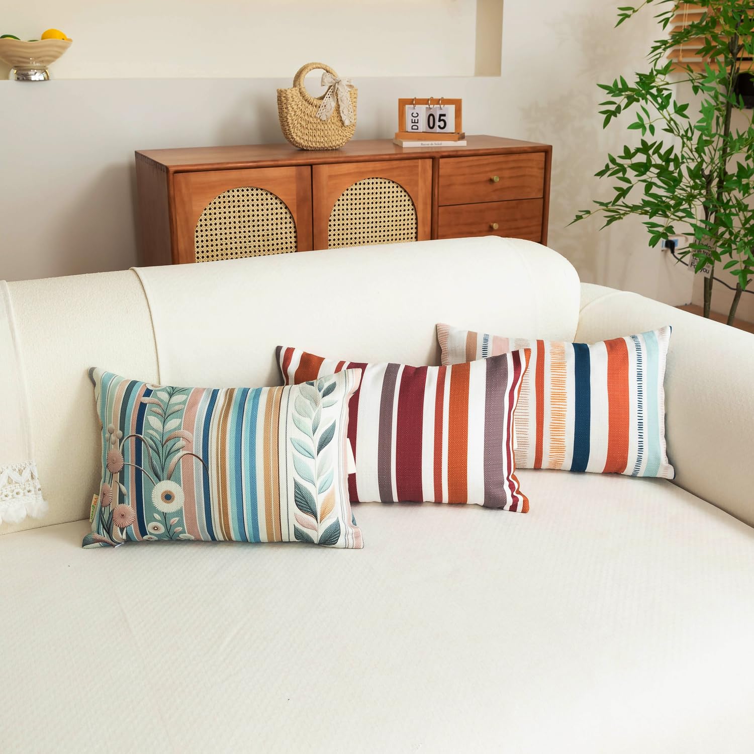 vmgreen hand holding pillow showing compact 11x16 inch size for travel