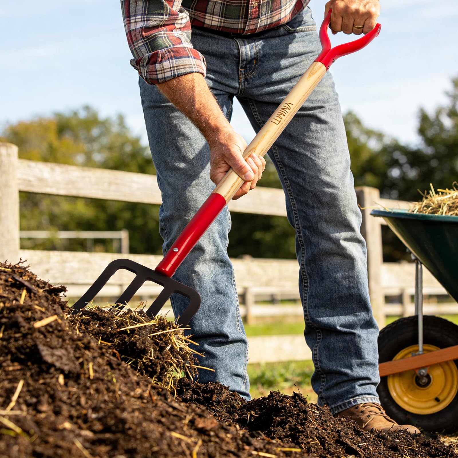 VNIMTI turning compost with fork demonstrating efficient aeration and lifting