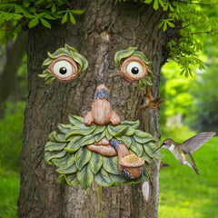 vomiceak front view showing resin tree face and feeder, adds garden personality