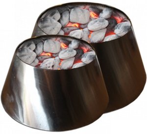 VORTEX next to grill tools for scale, showing medium size compatibility with kettles