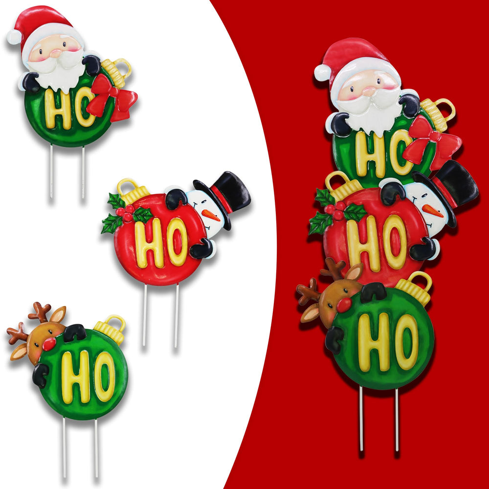 Voumsil front view of three metal Christmas stakes adding curb appeal