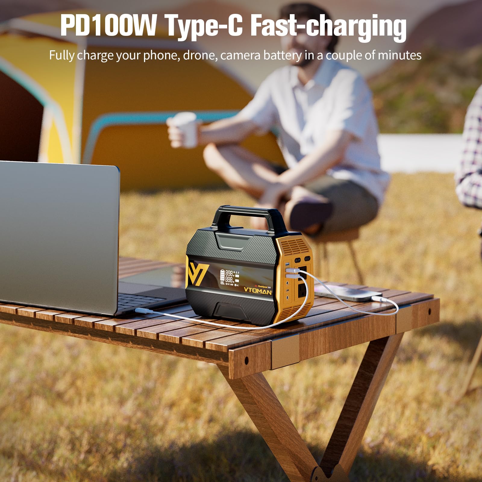 VTOMAN FlashSpeed 300 charging laptop and phone demonstrating fast 100W PD convenience