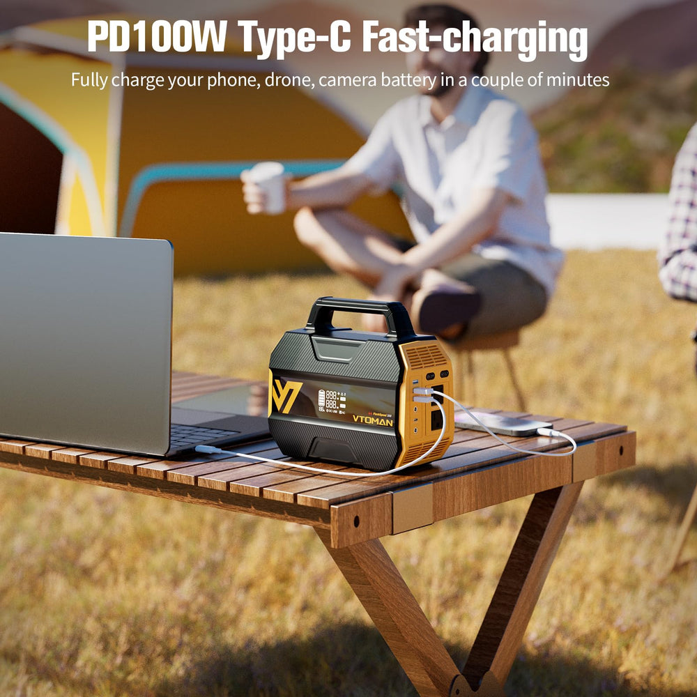 VTOMAN FlashSpeed 300 charging laptop and phone demonstrating fast 100W PD convenience