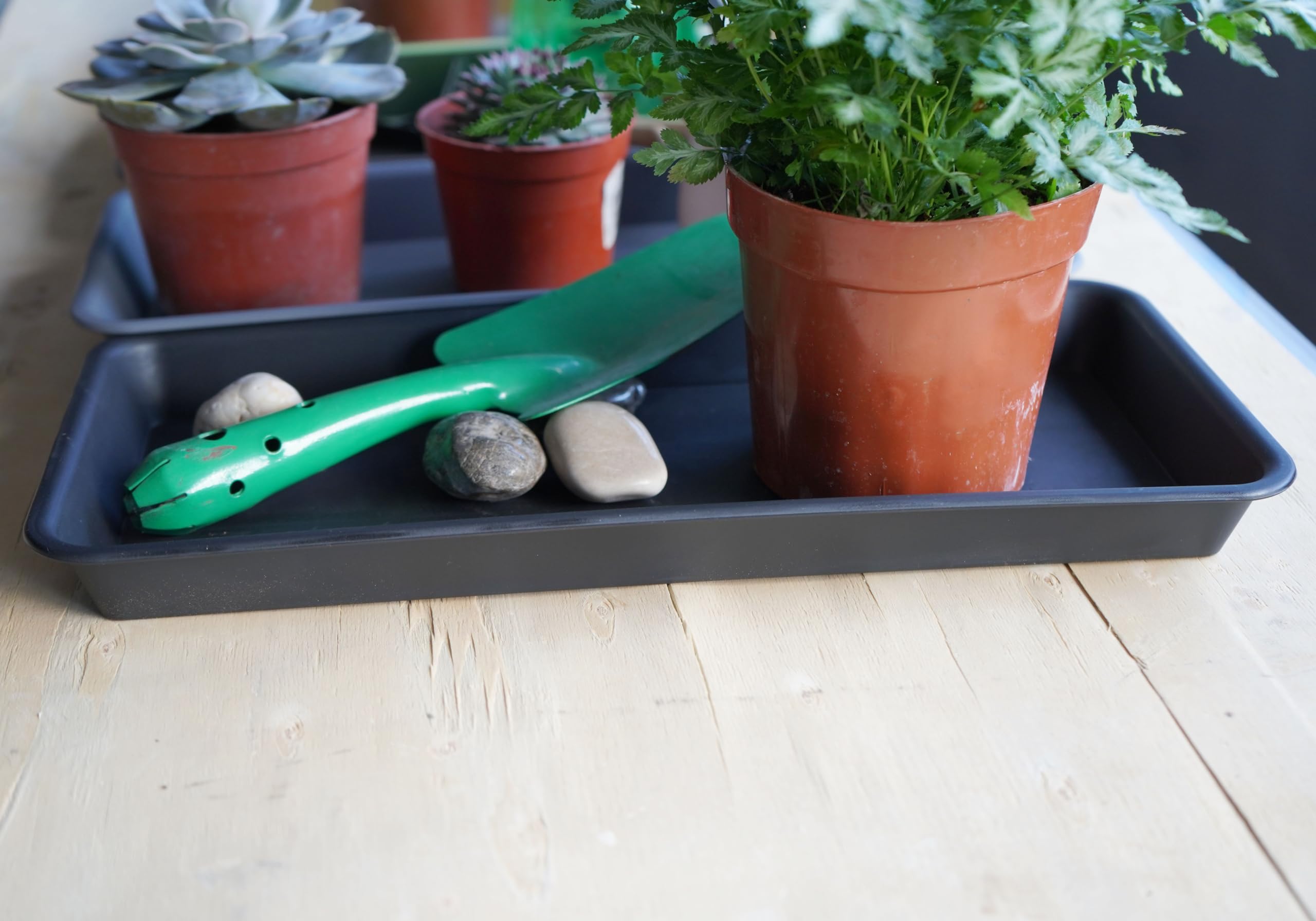 VUWEZ tray collecting drainage water to protect floors and furniture
