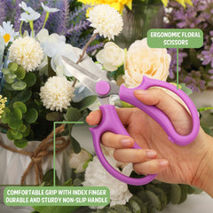 VZZNN scissors held in hand showing compact 6.5-inch size and ergonomic grip