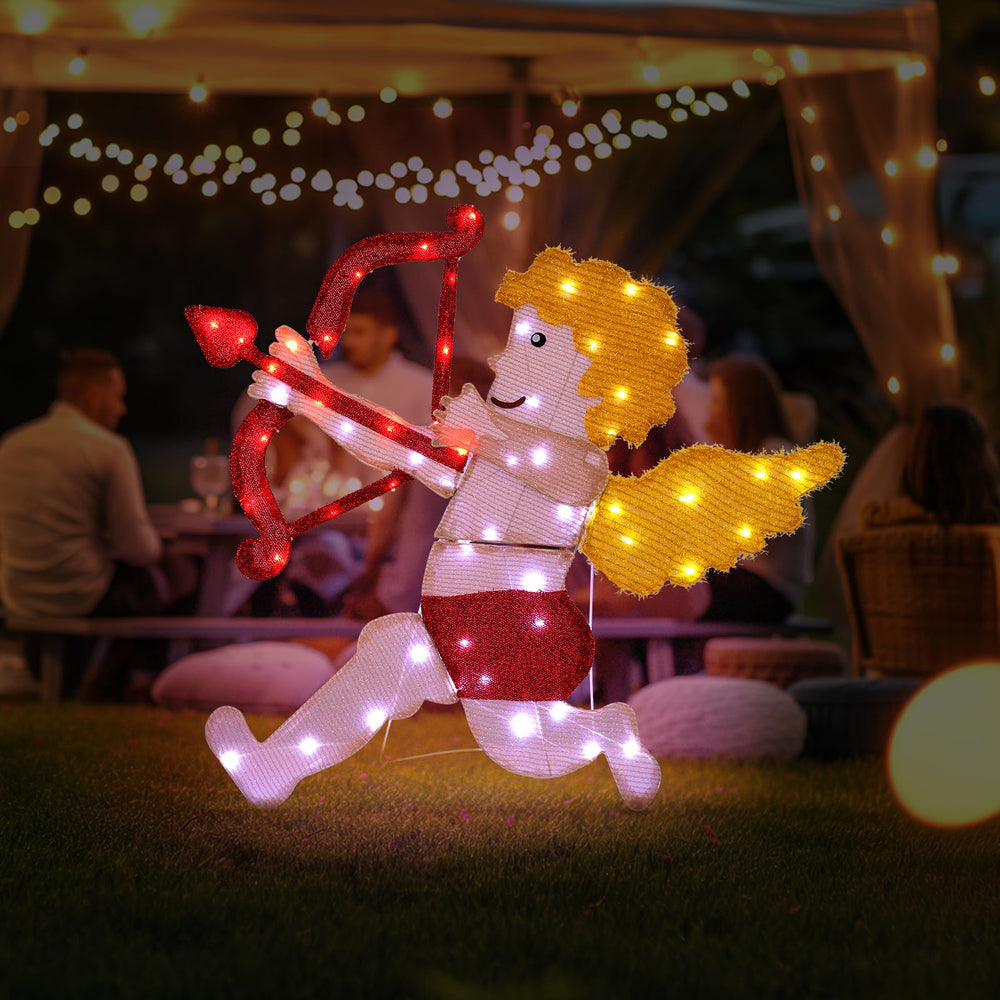 W Empty close-up of LED lights on Cupid highlighting bright red bow detail