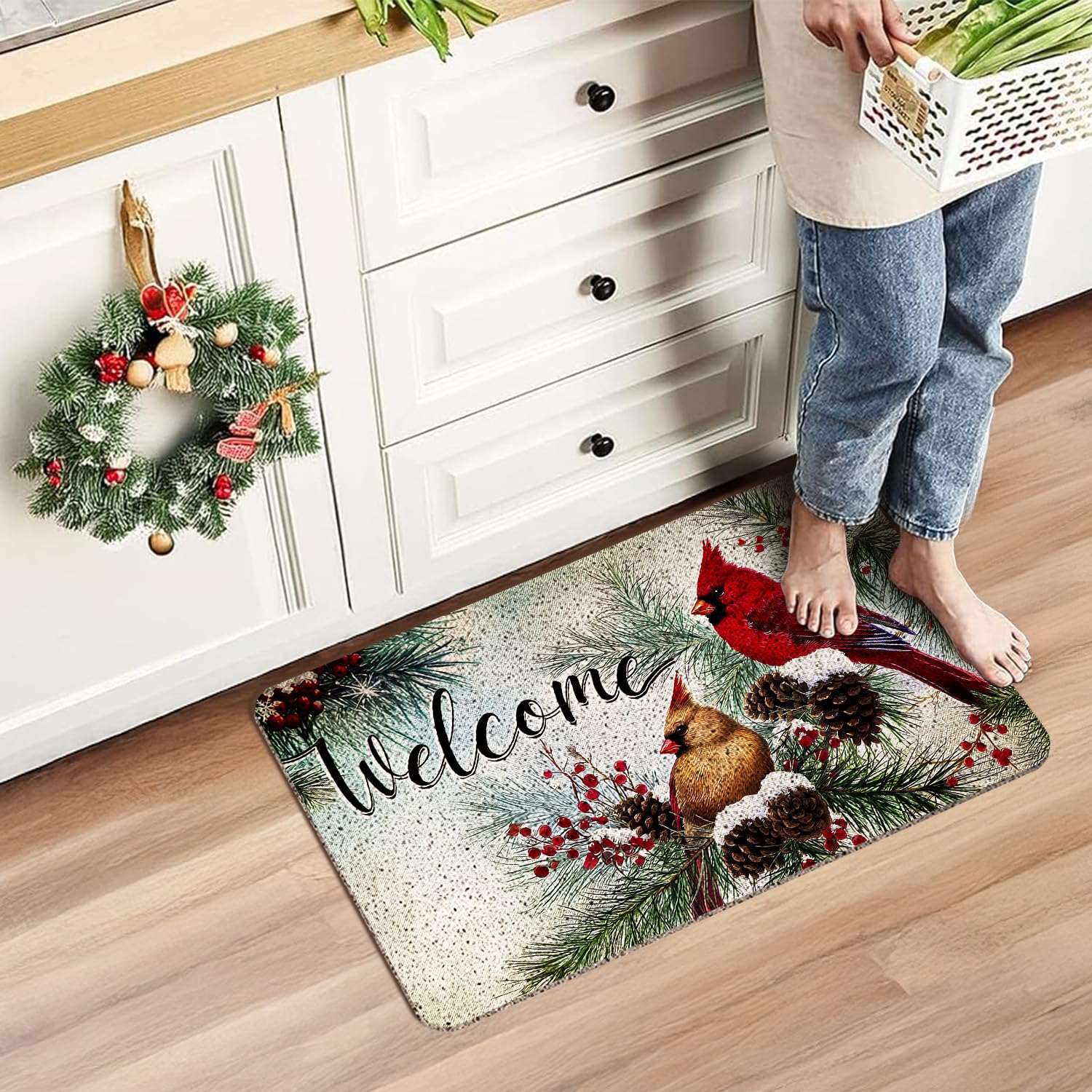 WARDOS mat staged on porch with winter decor creating warm seasonal welcome