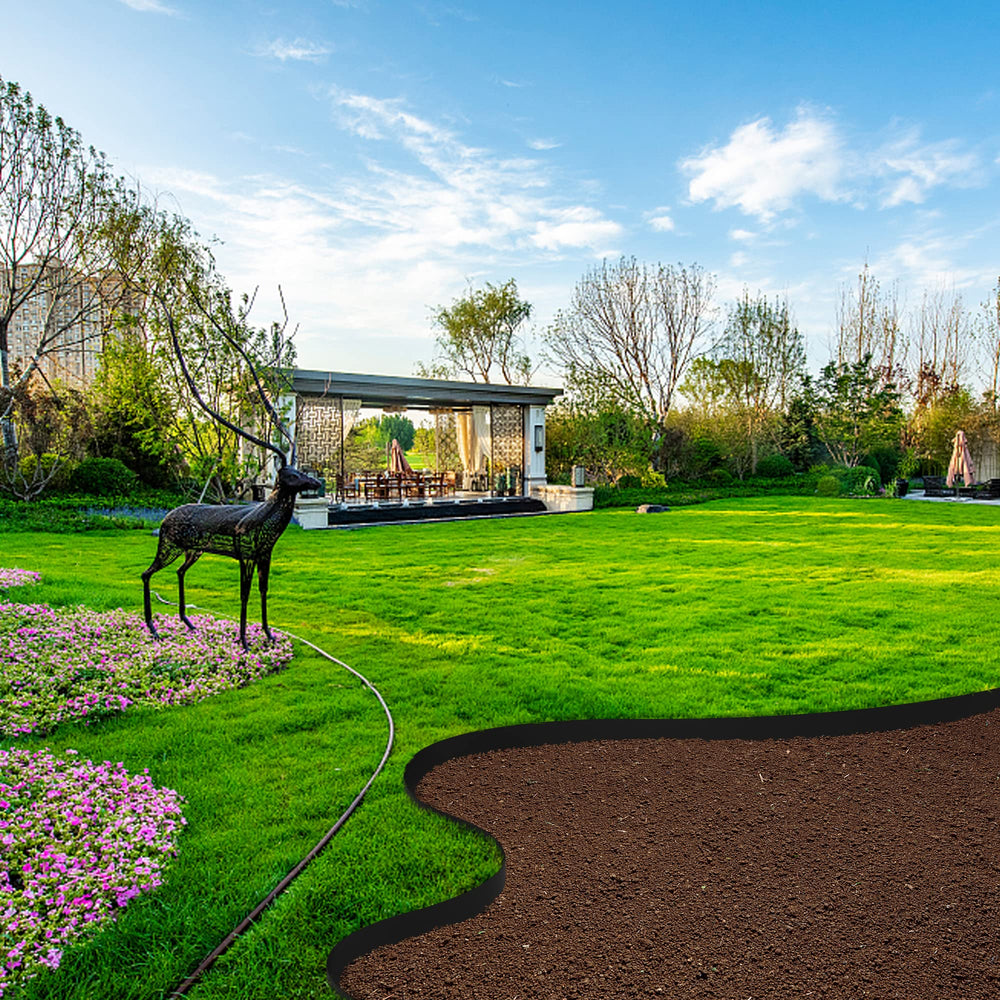 Watayo flexible edging forming a curved flower bed for neat landscaping