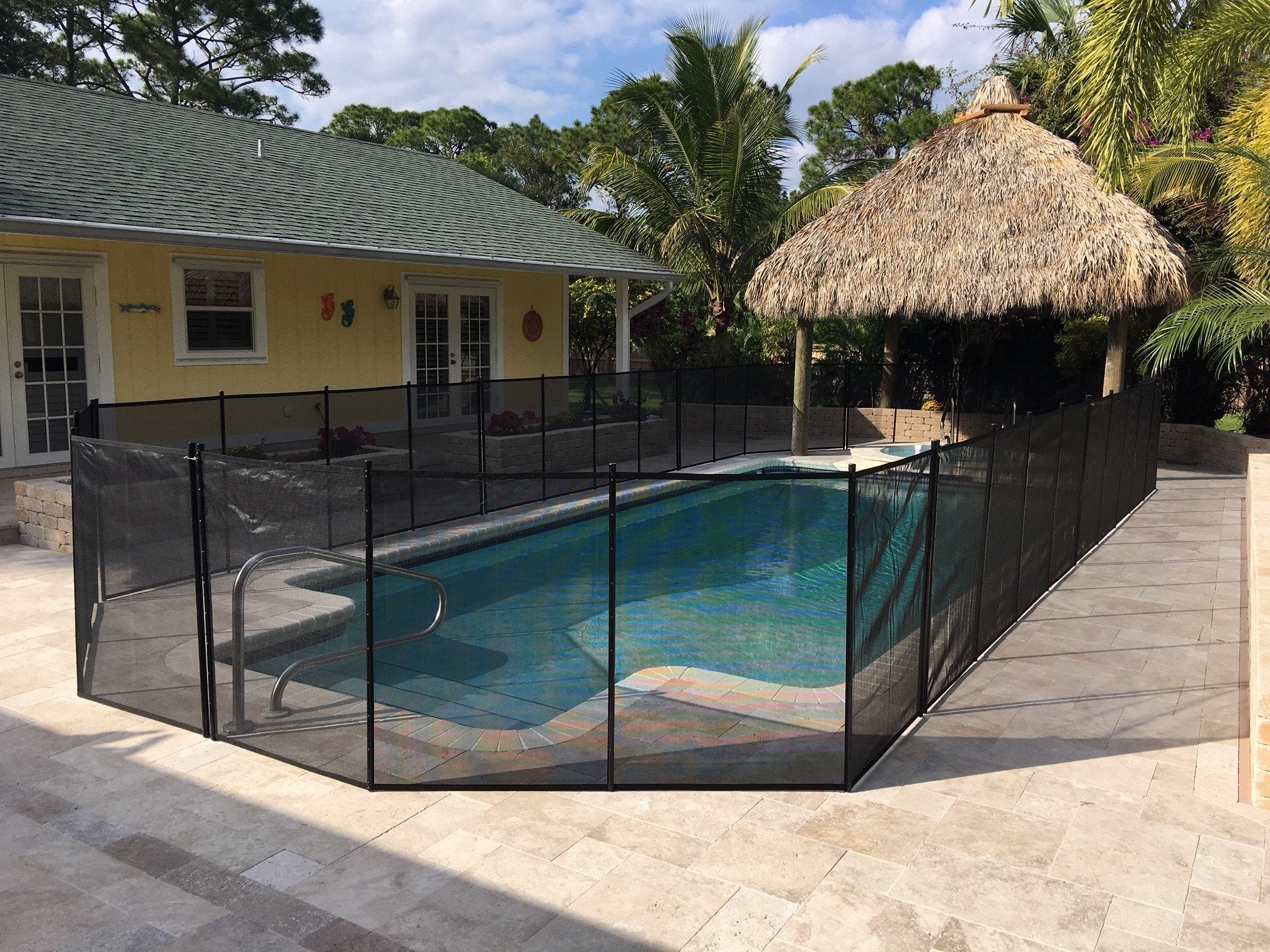 WaterWarden poolside lifestyle scene showing safe supervision and easy adult access