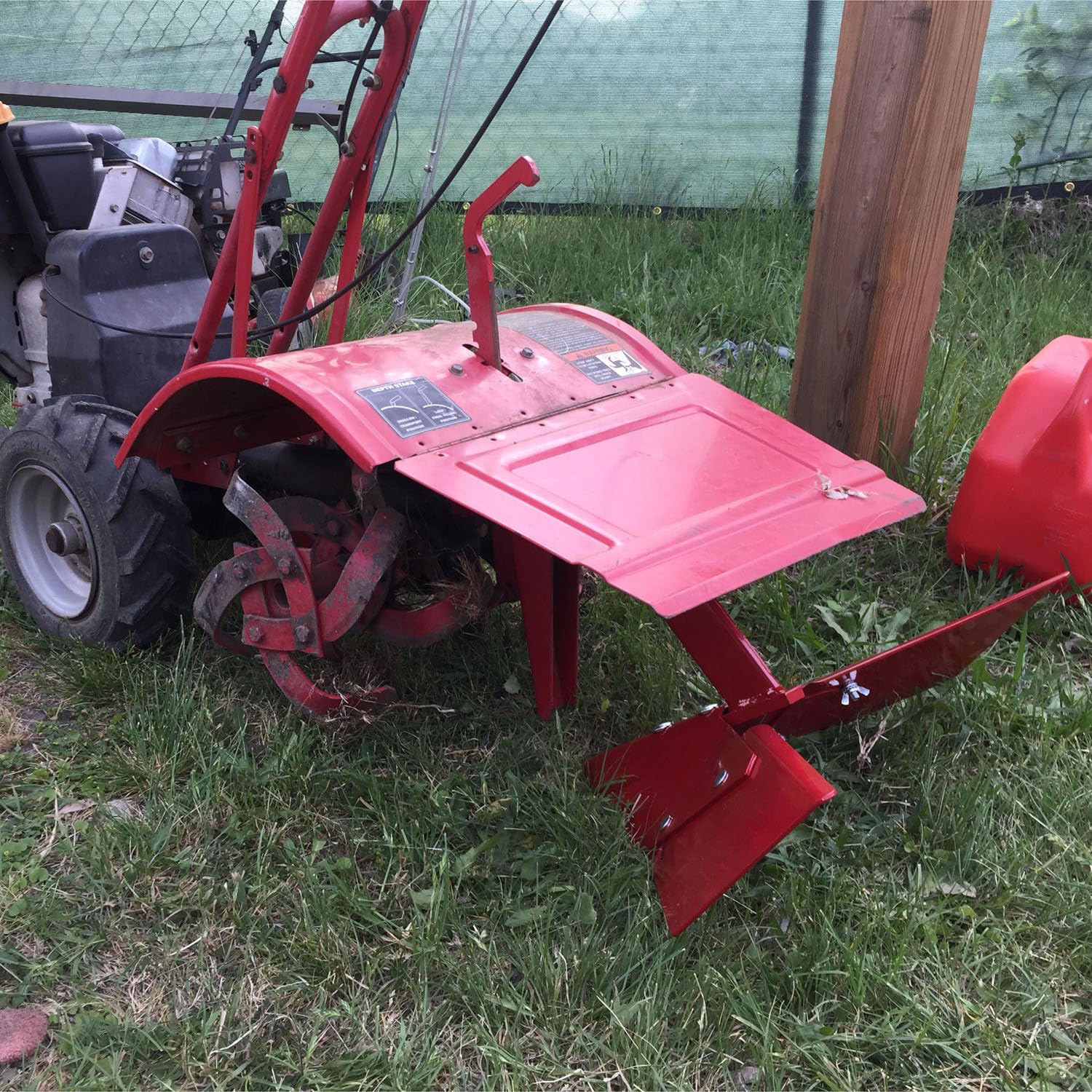 Wawews close-up of adjustable steel wing showing angle lock for consistent furrow shaping