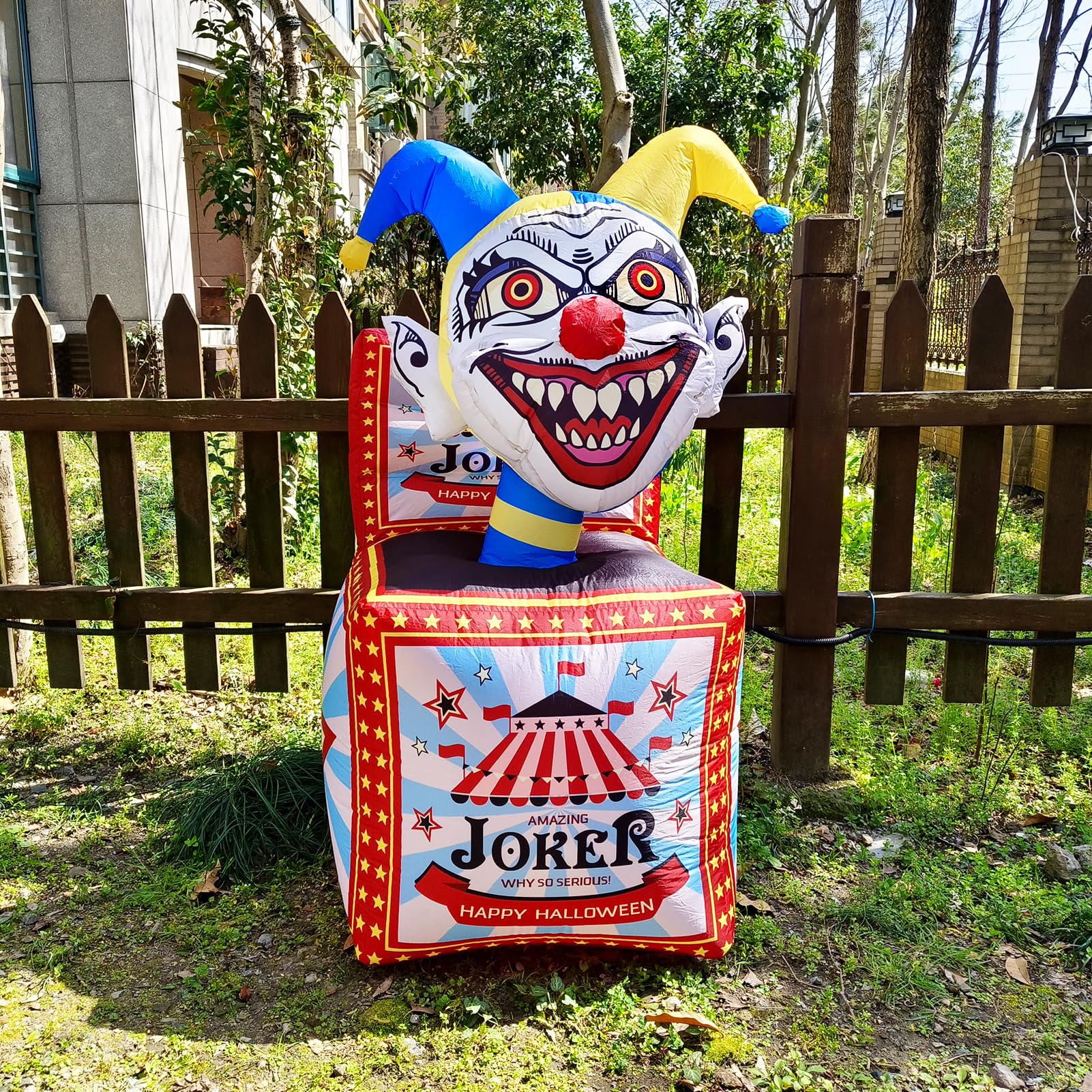 WBHome clown box in yard next to pumpkins showing size and scale for displays