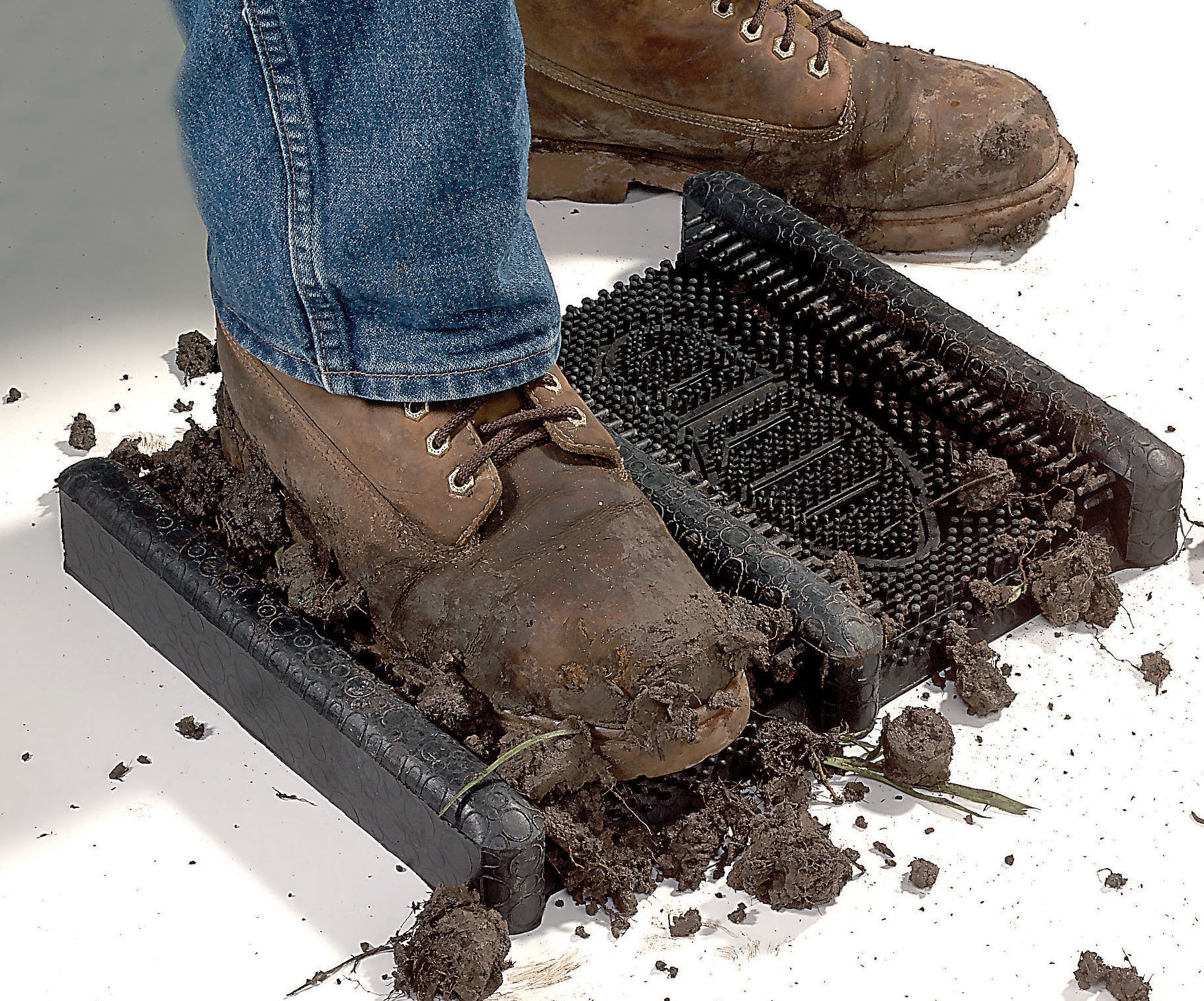 Wearwell Mud Chucker close-up of pliable rubber fingers removing grime