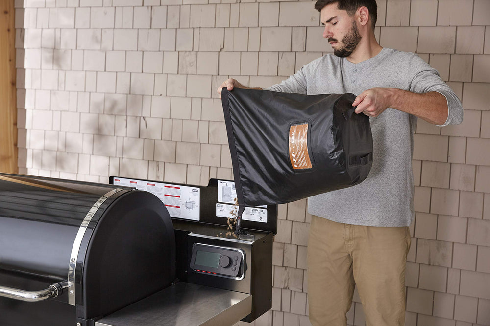 Weber bag filled with charcoal beside grill illustrating ready-to-use benefit