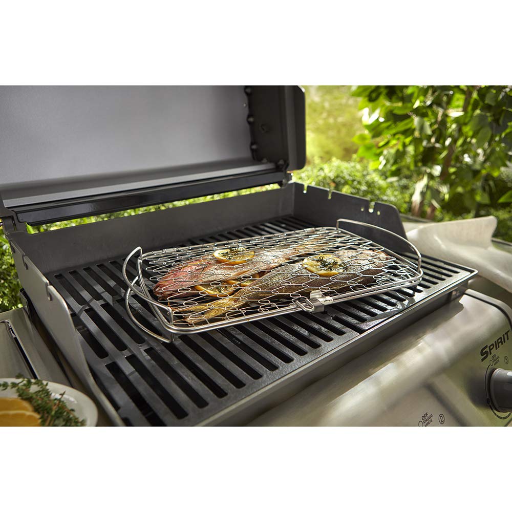 Weber basket in use with fish fillets on a grill demonstrating even cooking and easy flipping