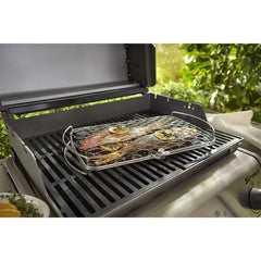 Weber basket in use with fish fillets on a grill demonstrating even cooking and easy flipping