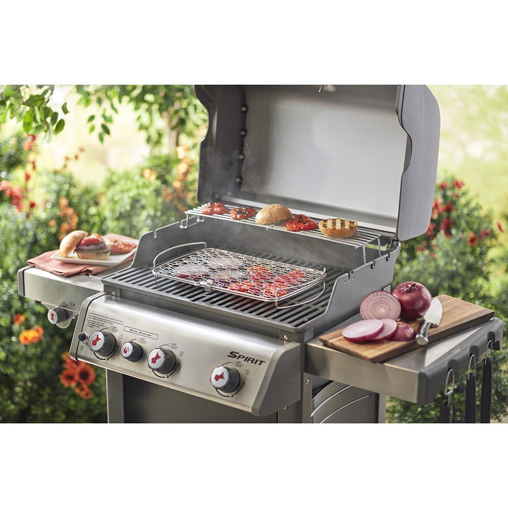 Weber basket size comparison on a cutting board to show scale and grill compatibility