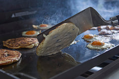Weber close-up of beveled edge and rounded corner providing easy sliding and scooping