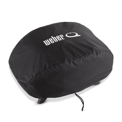 Weber bonnet cover next to ruler scale demonstrating fit and size