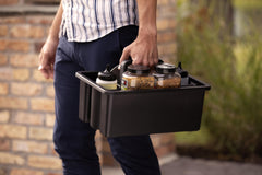Weber caddy filled with sauces and seasonings for efficient transport benefit