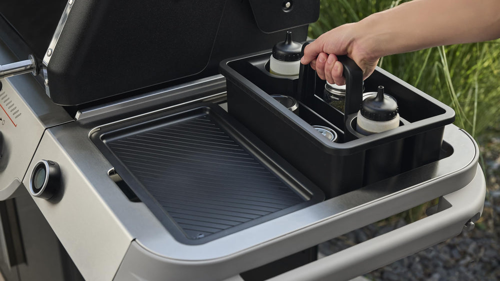 Weber caddy with handle folded for compact storage and spill-prevention benefit