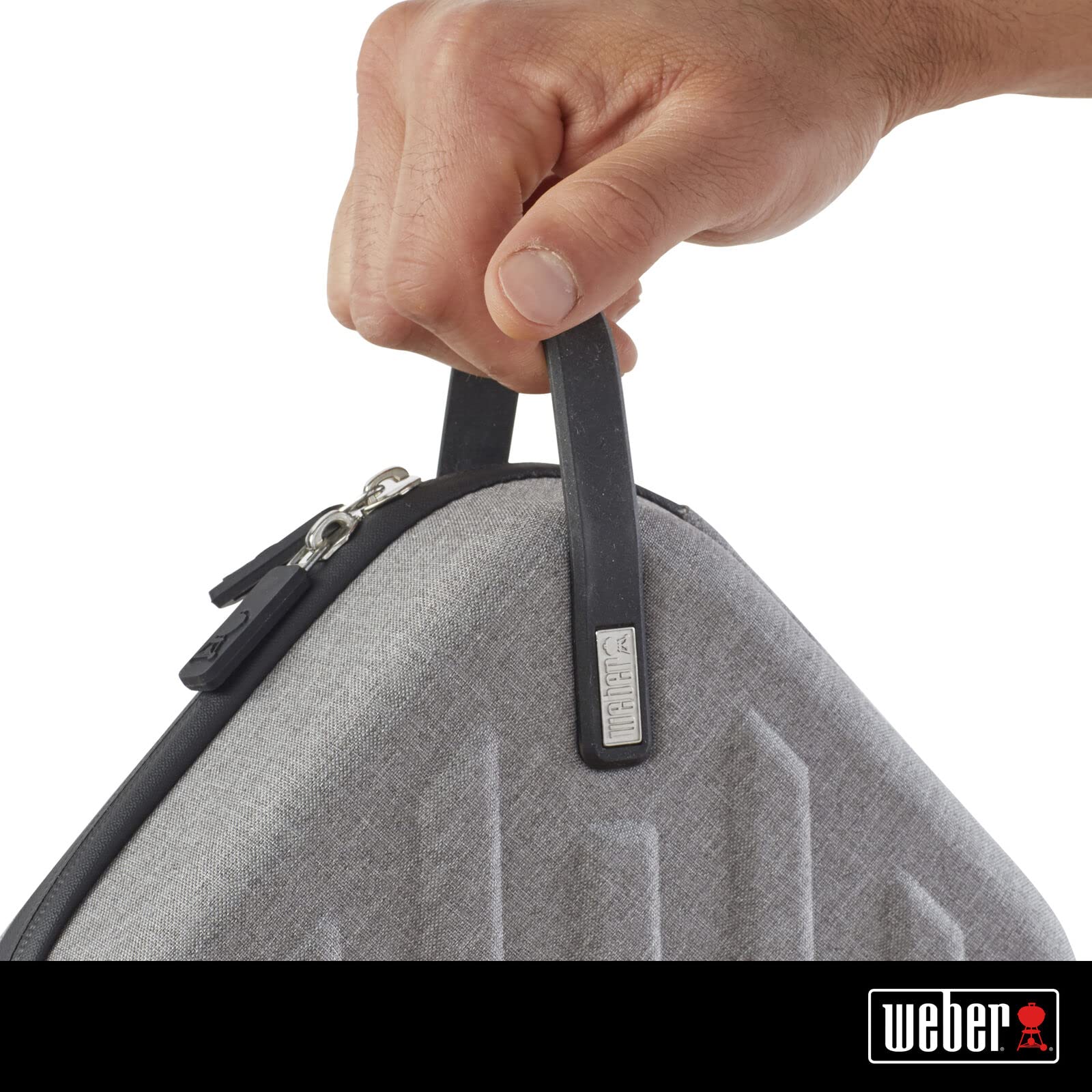 Weber case mesh pocket close-up holding USB cable and small accessories securely