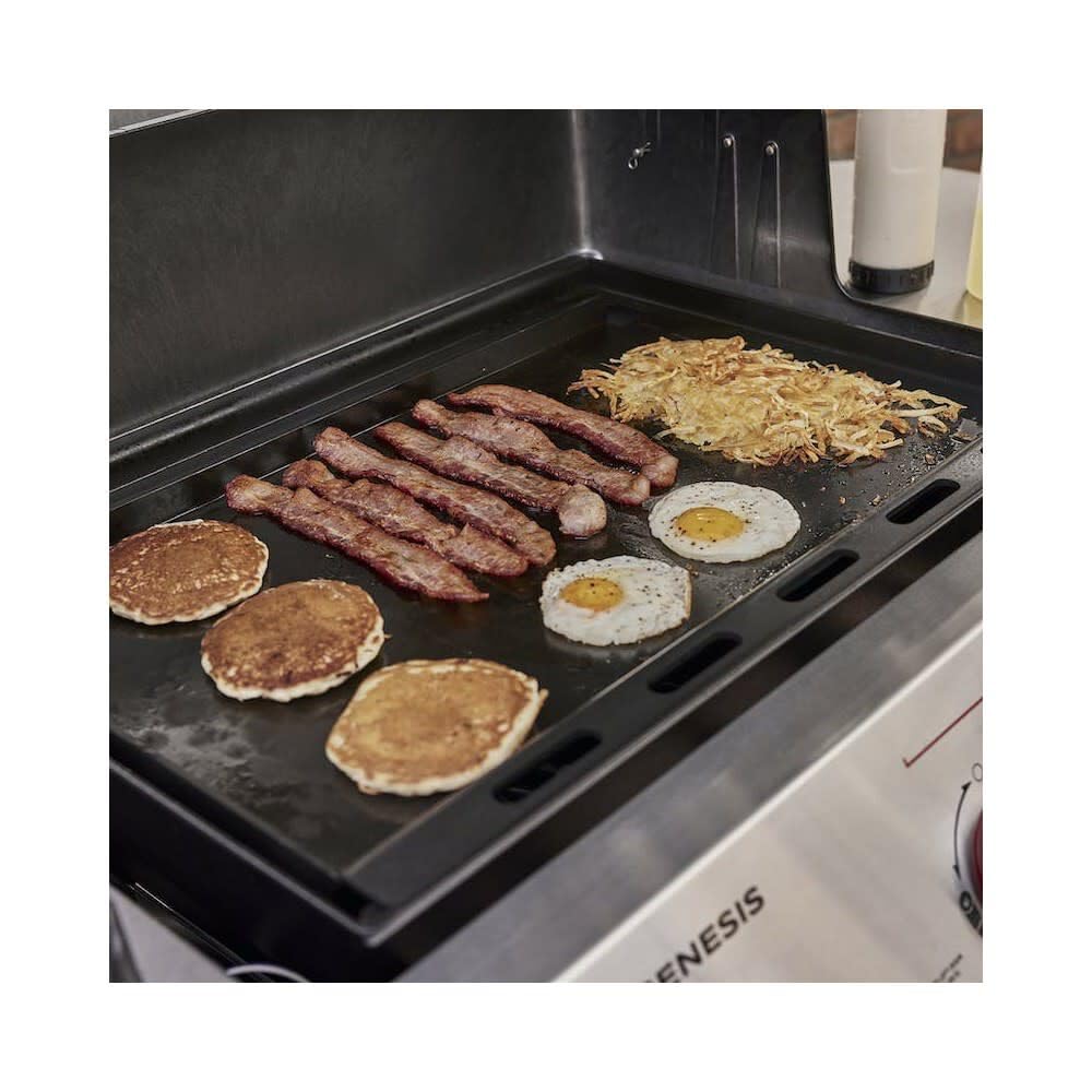 Weber pancakes cooking on griddle showing even browning and family-friendly versatility