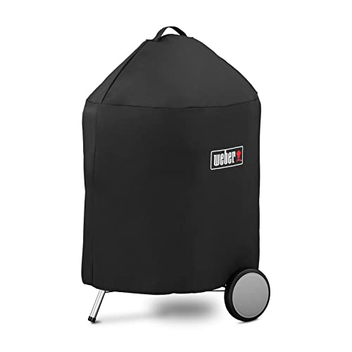 Weber cover next to grill for size comparison showing correct 22-inch fit